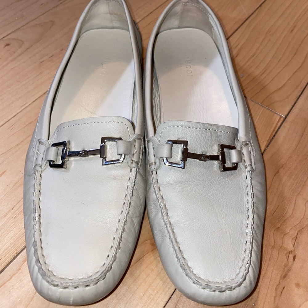 White Gucci driving loafers